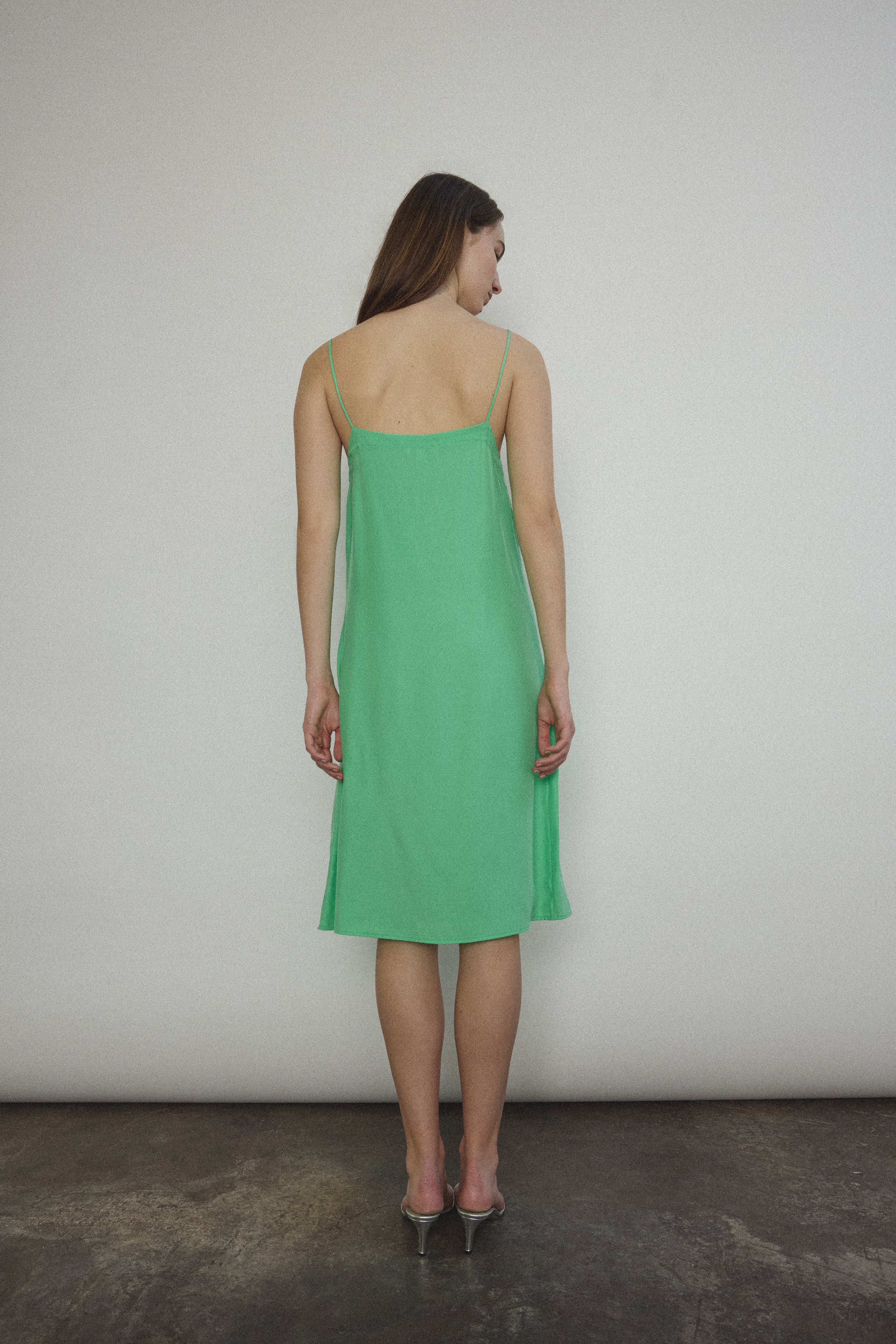 Back view of the celadon silk charmeuse Kamperett Short Slip.