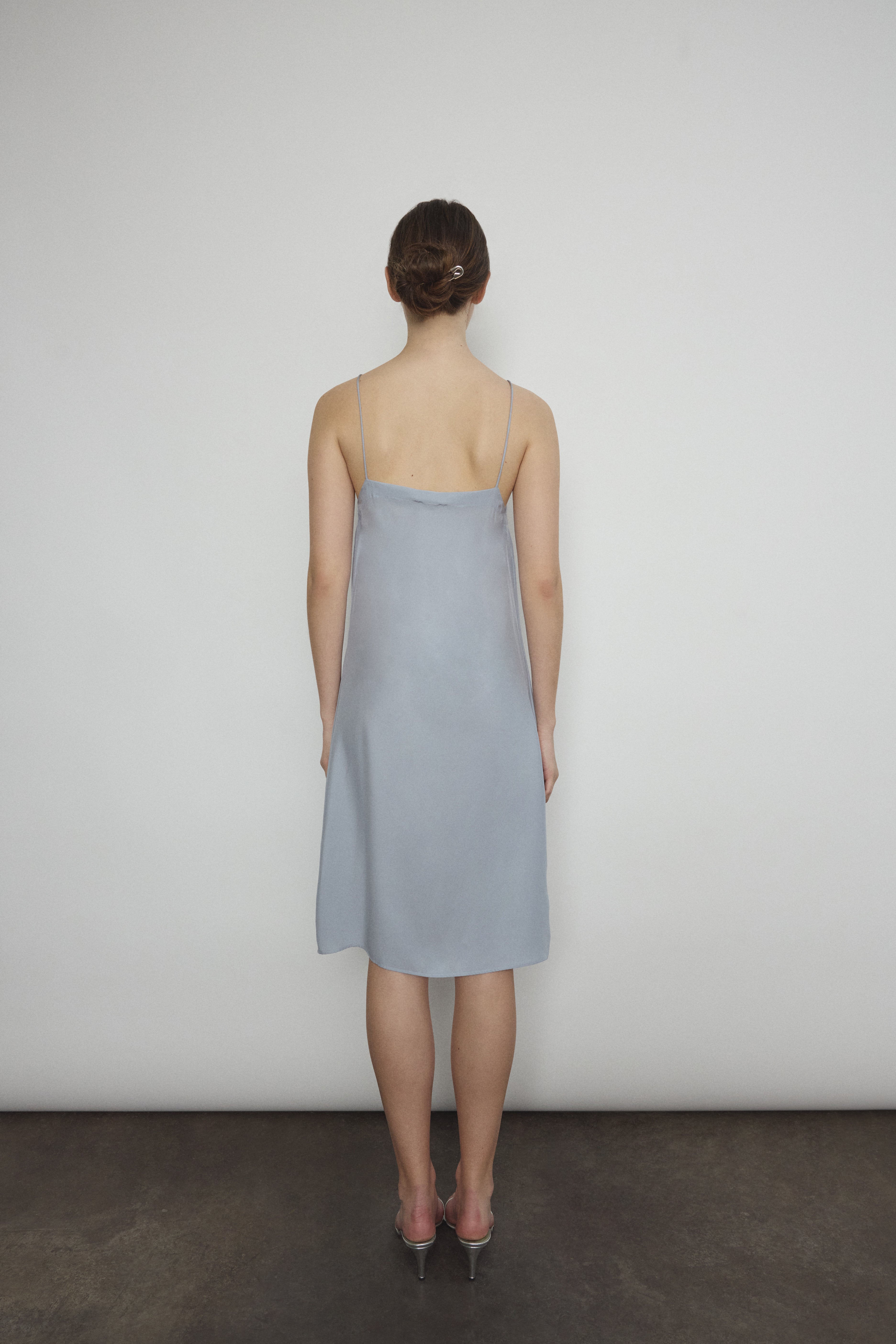 Back view of the powder blue silk charmeuse Kamperett Short Slip.