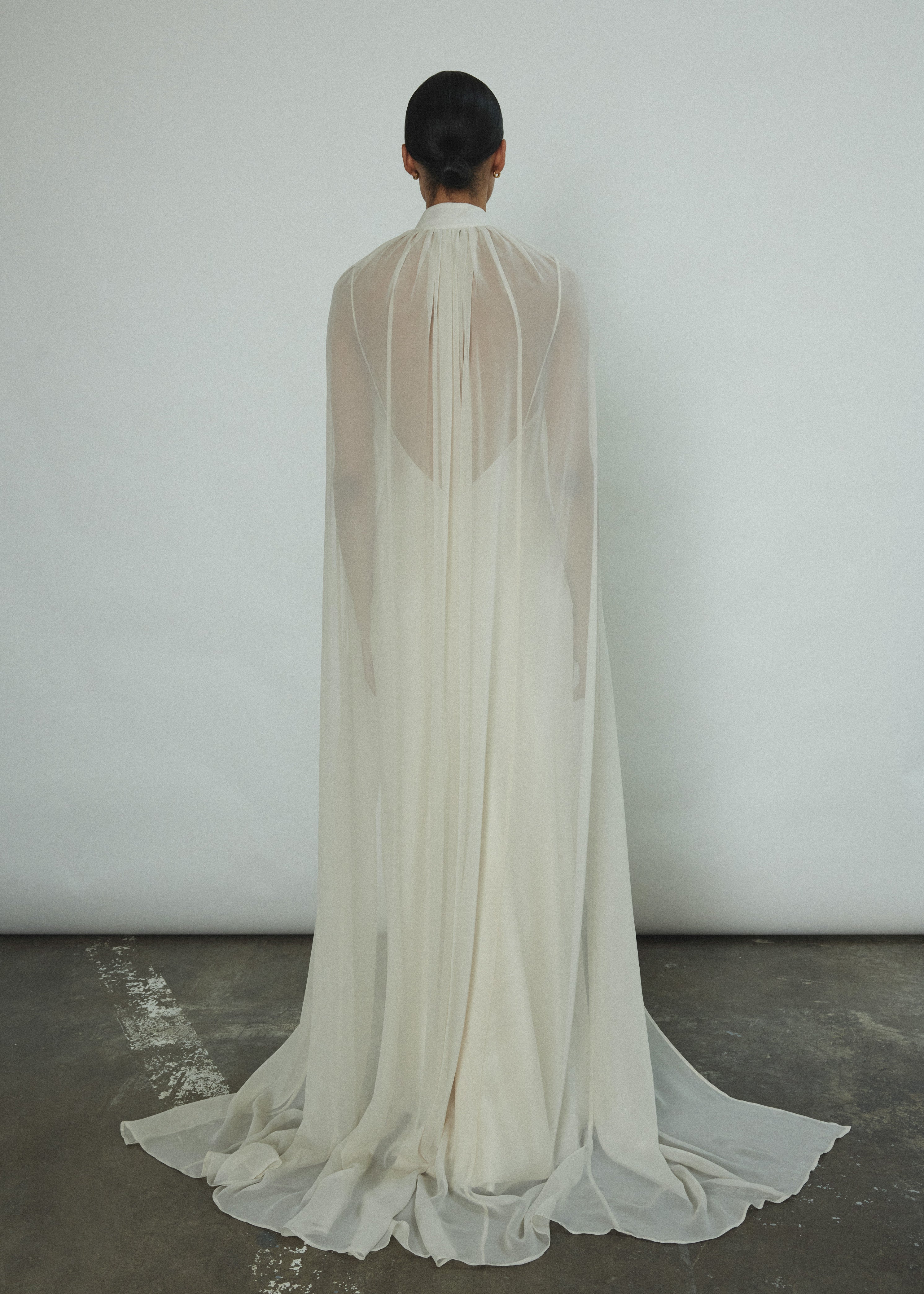 Back view of the ivory silk chiffon Kamperett Choker Cape.