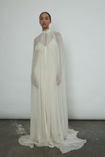 Editorial portrait of a bride in the ivory silk chiffon Kamperett Choker Cape.