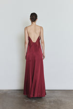 Back view of the bordeaux Kamperett Simone Slip Dress showing the sheer diamond-shaped panel detailing in silk organza.