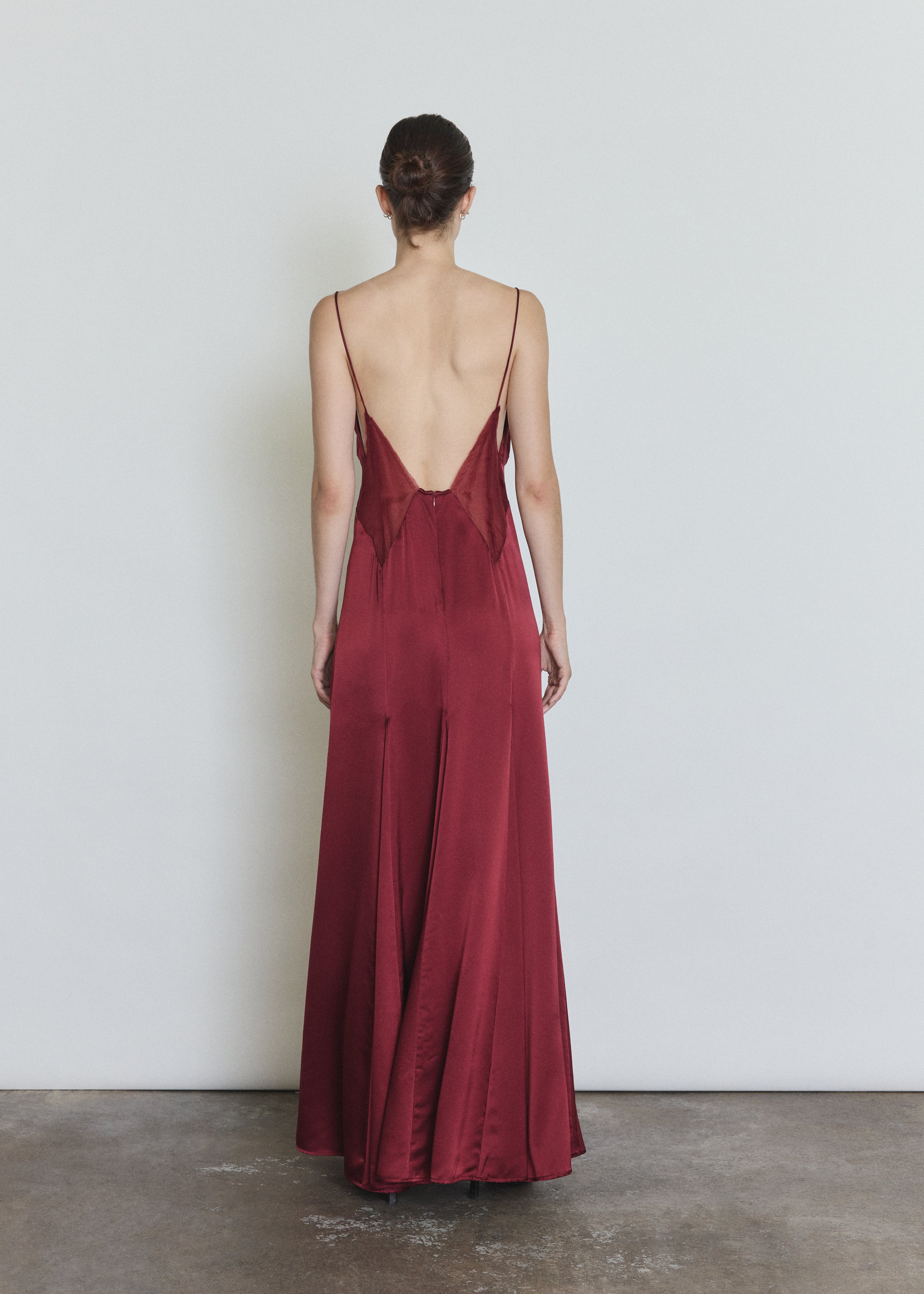 Back view of the bordeaux Kamperett Simone Slip Dress showing the sheer diamond-shaped panel detailing in silk organza.