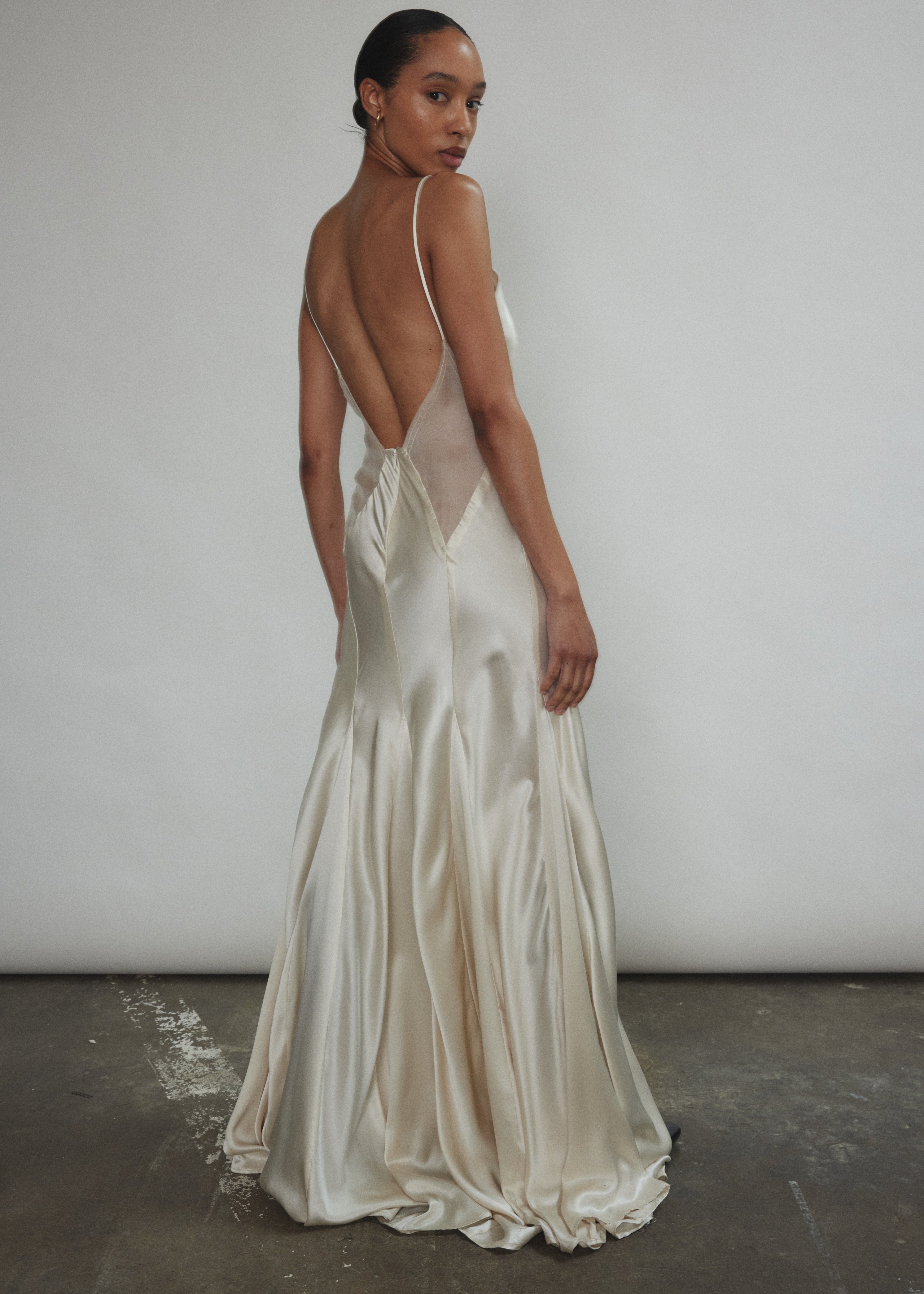 Back view of the ivory silk charmeuse Kamperett Simone Slip Dress with invisible zip closure.