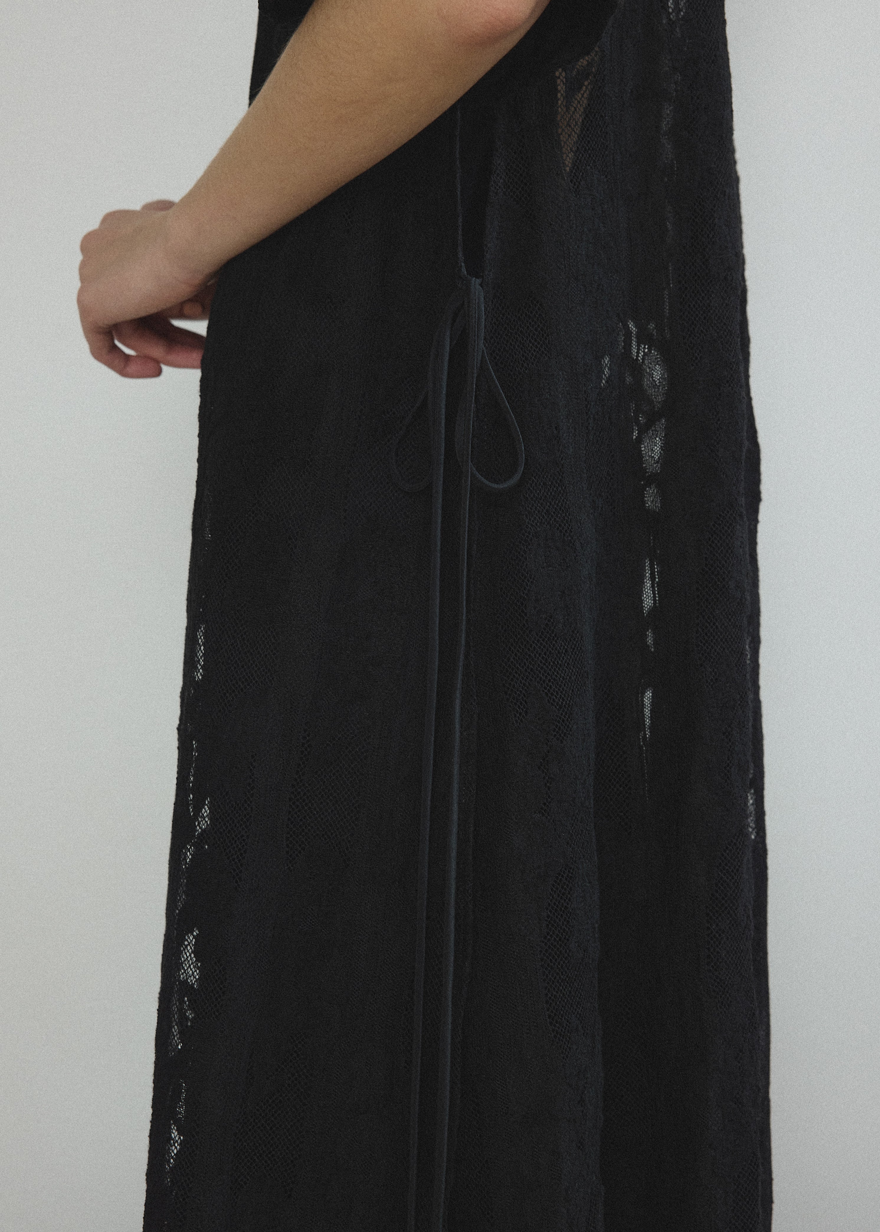 Back view of the black French lace Kamperett Thea Lace Sheath Dress.