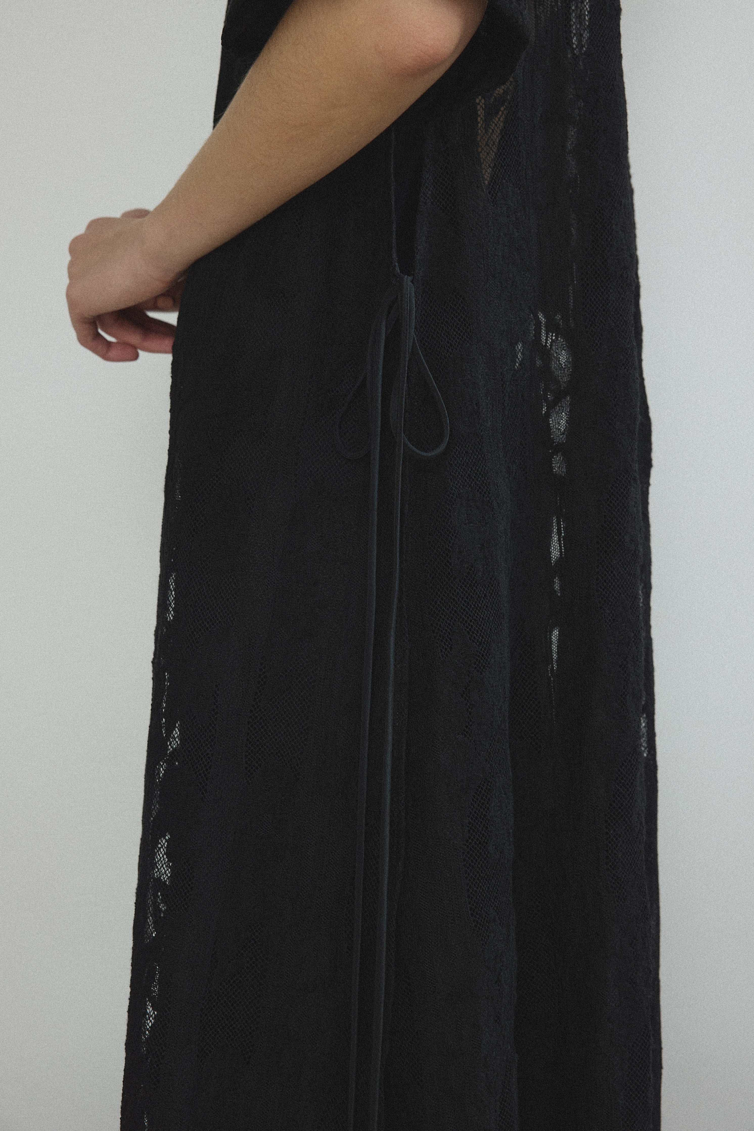 Back view of the black French lace Kamperett Thea Lace Sheath Dress.
