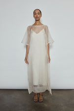 Ivory silk organza midi sheath dress, straight-cut silhouette with raw edge neckline and wide hem facing, handcrafted in California.