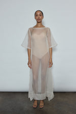 Ivory silk organza midi dress with raw edge neckline and self corded ties. Minimalist sheath silhouette, handcrafted in California. Effortless luxury occasion wear.