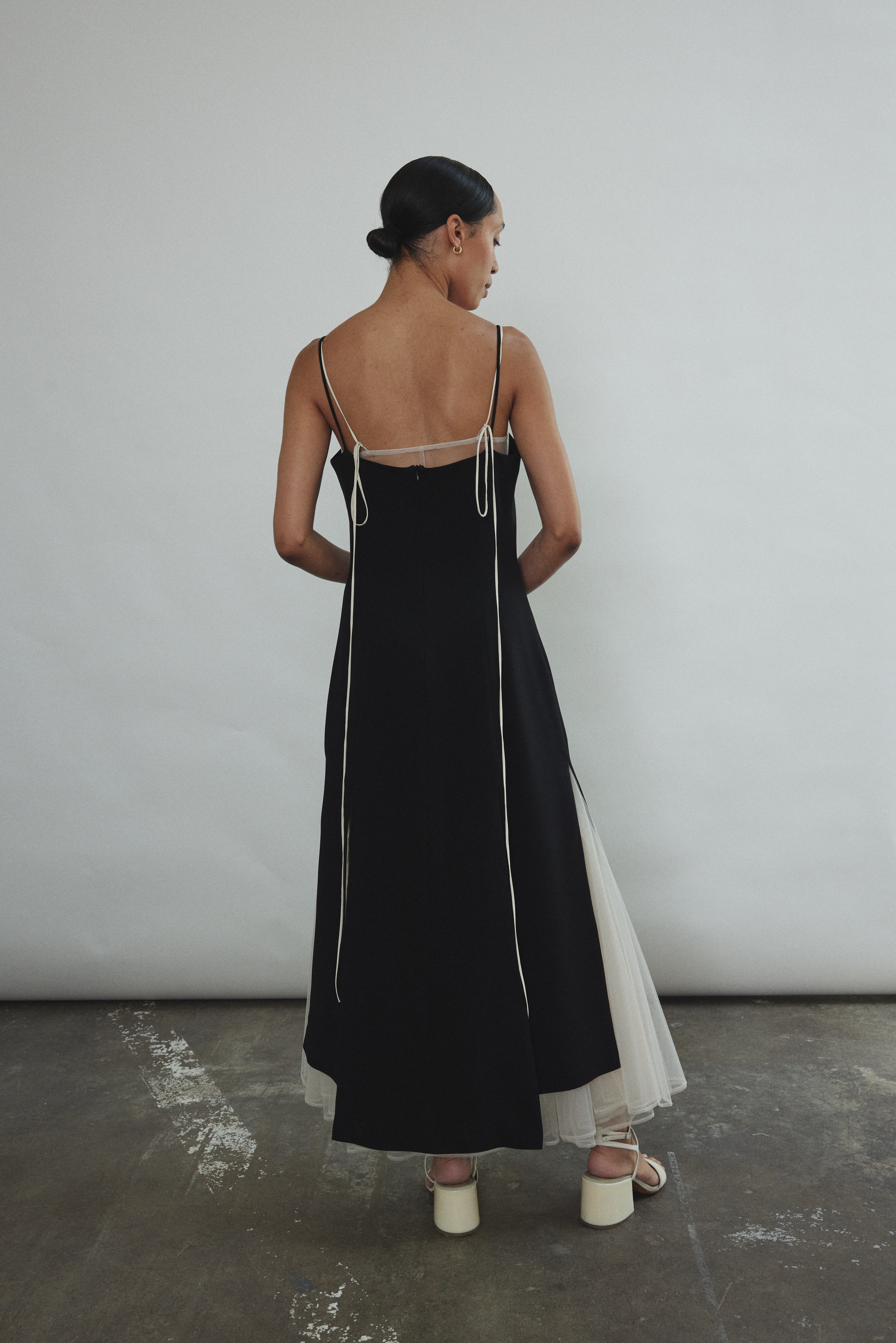 Back view of the black crepe Kamperett Theodora Dress.