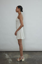 Back view of the ivory silk Kamperett V-Neck Mini Slip.