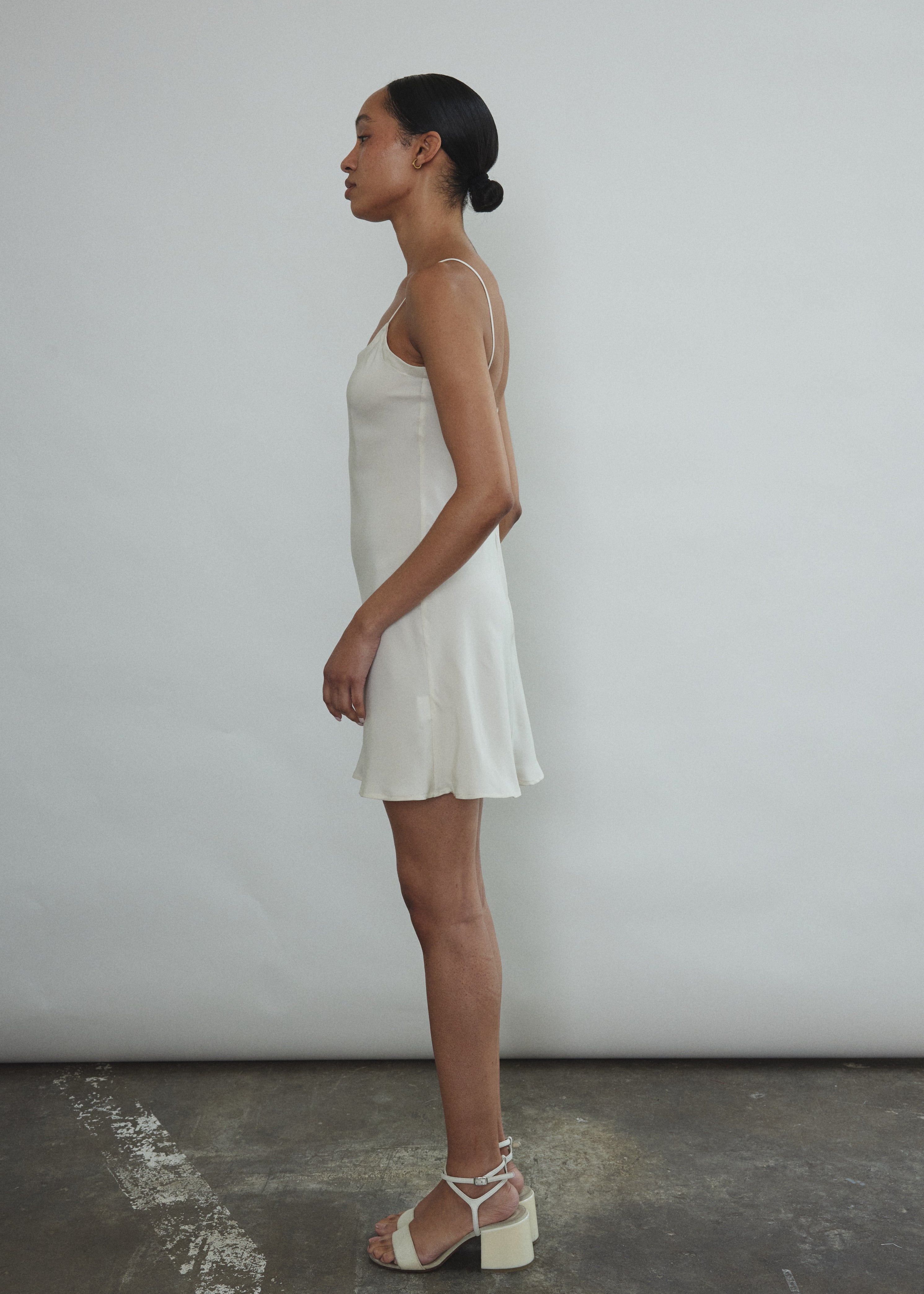 Back view of the ivory silk Kamperett V-Neck Mini Slip.
