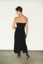 Back view of the black crepe Kamperett Verona Midi Dress with zipper closure at center back.