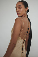 Close-up of Kamperett Violette Tulle Sheath in mocha — extended button closure at center back, California-made.