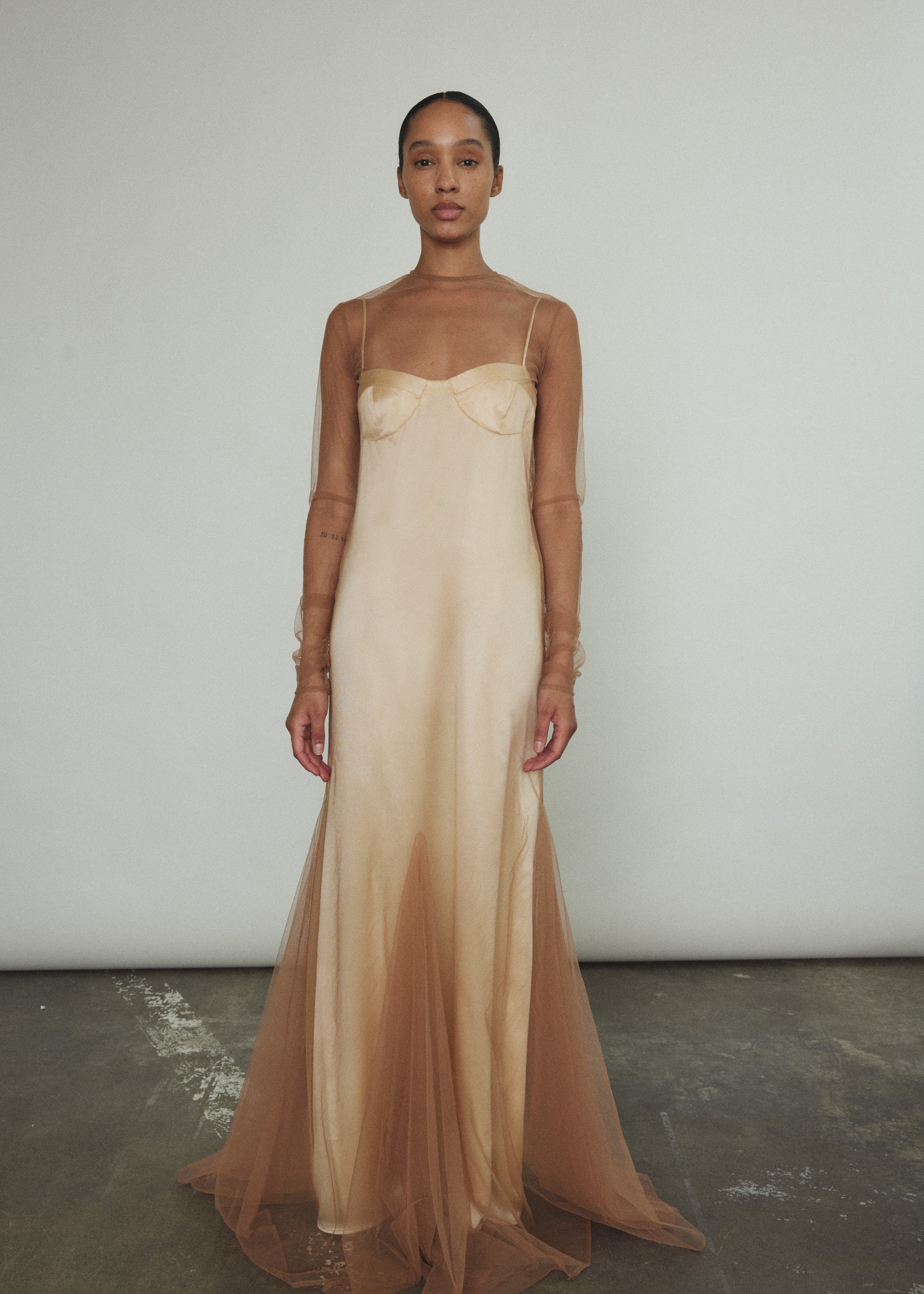 Kamperett Violette Tulle Sheath in mocha — sheer long sleeve sheath with jewel neckline and sweeping multi-godet hem, handcrafted in California.