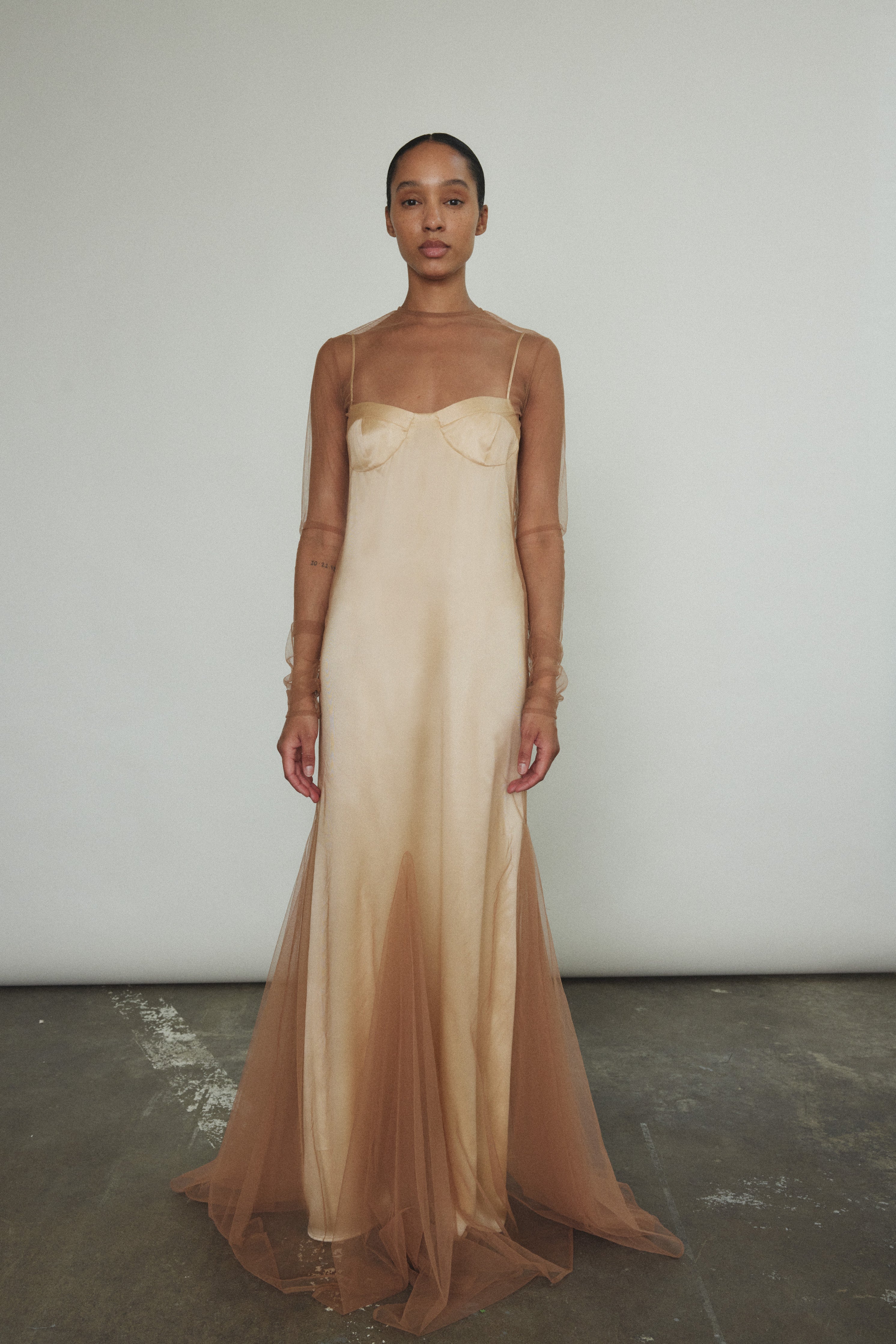 Kamperett Violette Tulle Sheath in mocha — sheer long sleeve sheath with jewel neckline and sweeping multi-godet hem, handcrafted in California.