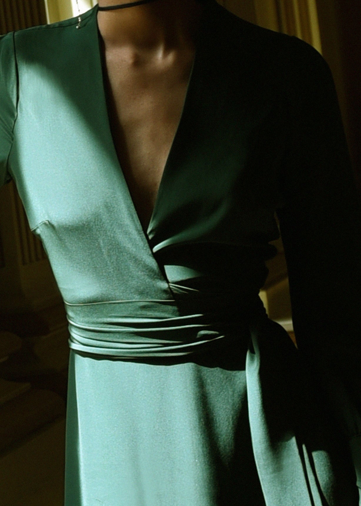 Back view of the dark green matte silk charmeuse Kamperett Adelaide Midi Dress.