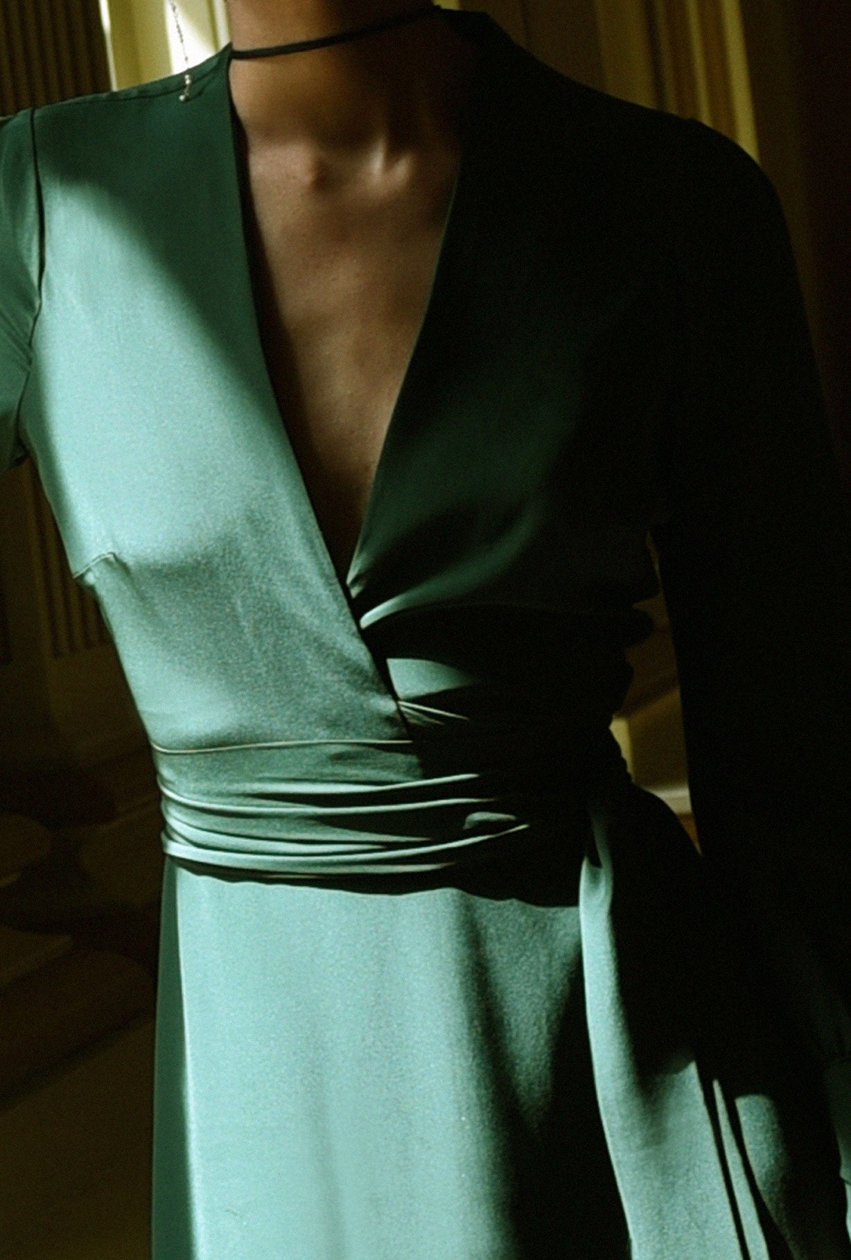 Back view of the dark green matte silk charmeuse Kamperett Adelaide Midi Dress.