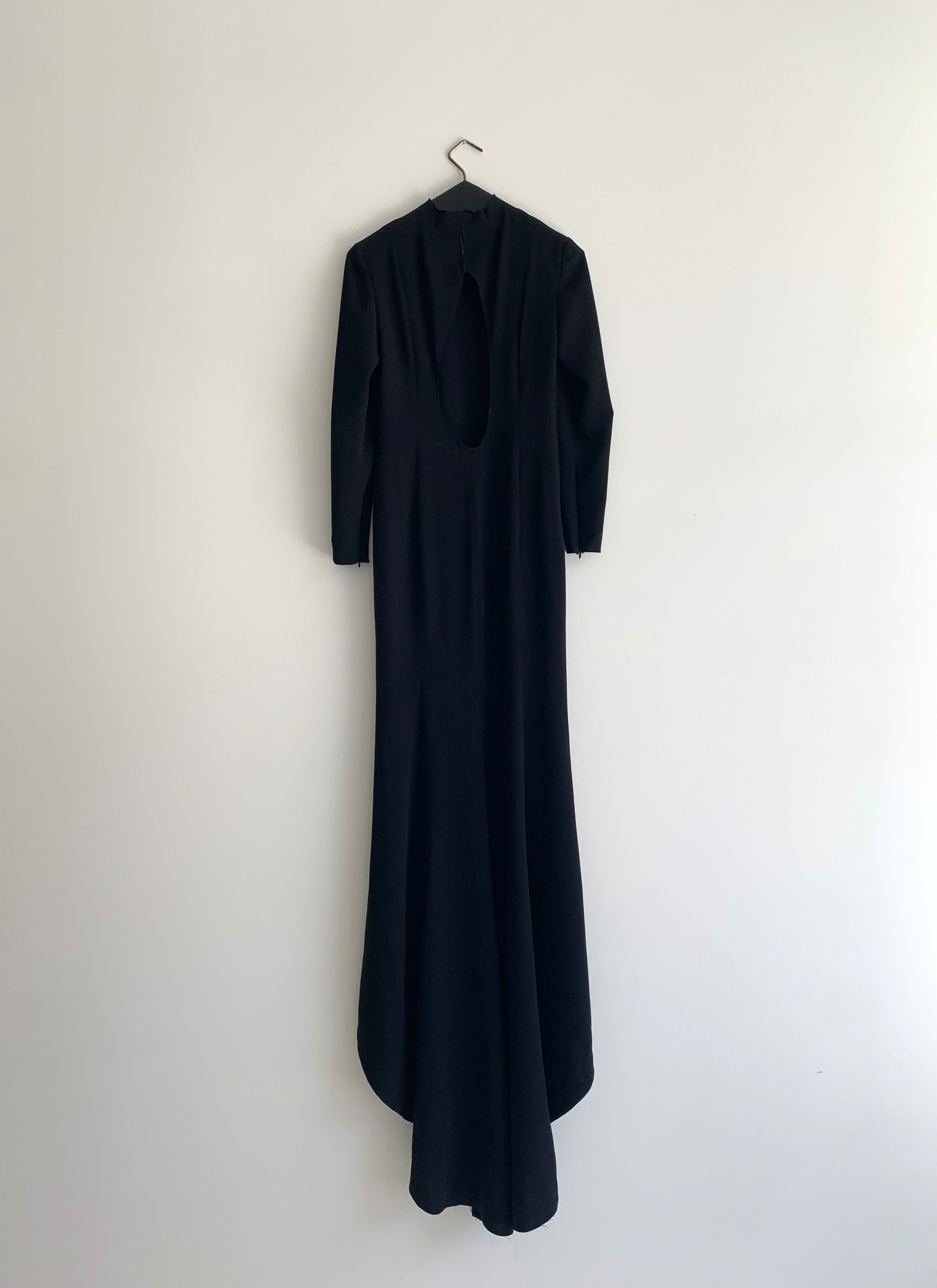 Alternate editorial image of the black acetate crepe Kamperett Arc Gown.