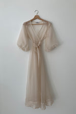 Editorial image of the ivory silk organza Kamperett Loretta Midi wedding dress.