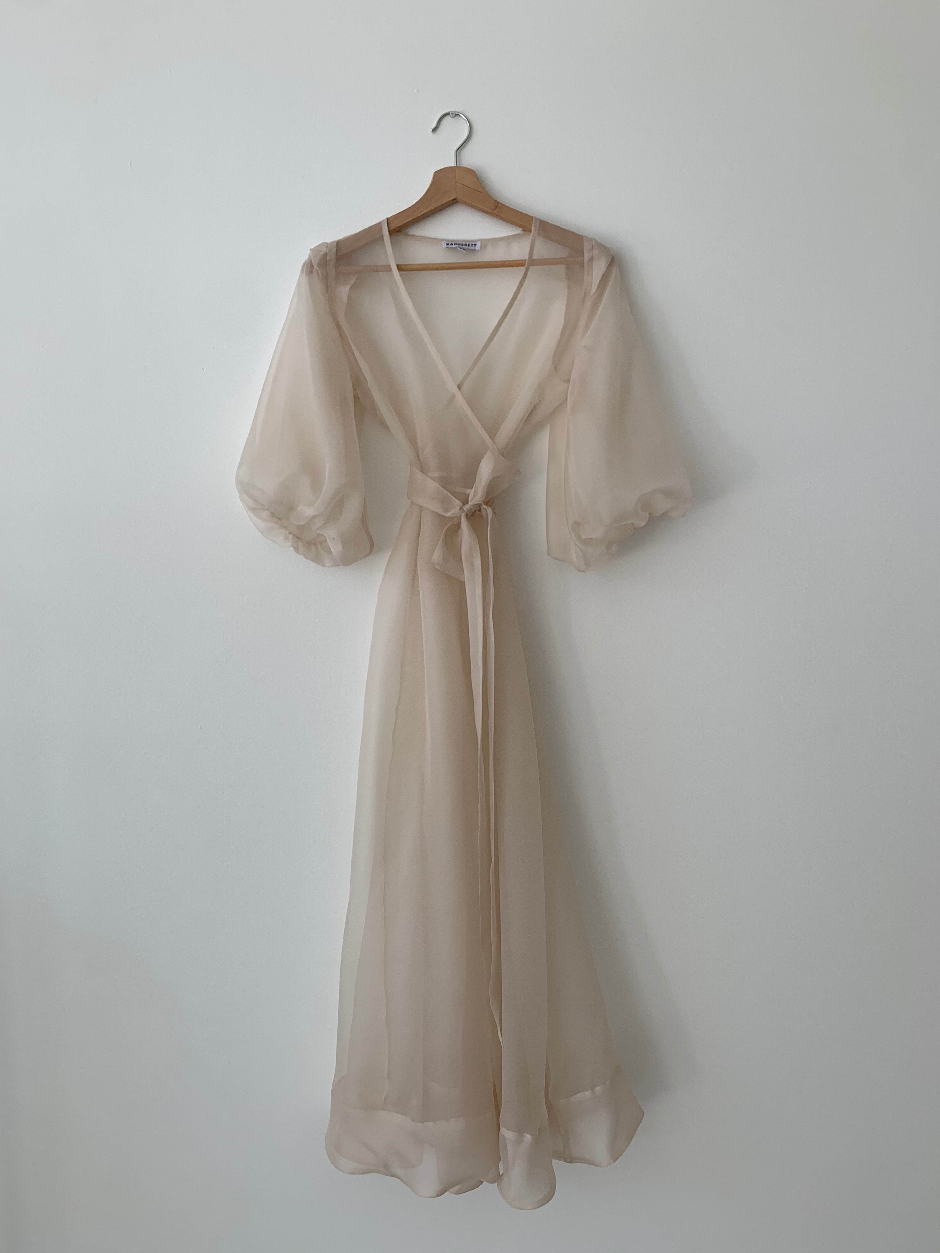 Editorial image of the ivory silk organza Kamperett Loretta Midi wedding dress.