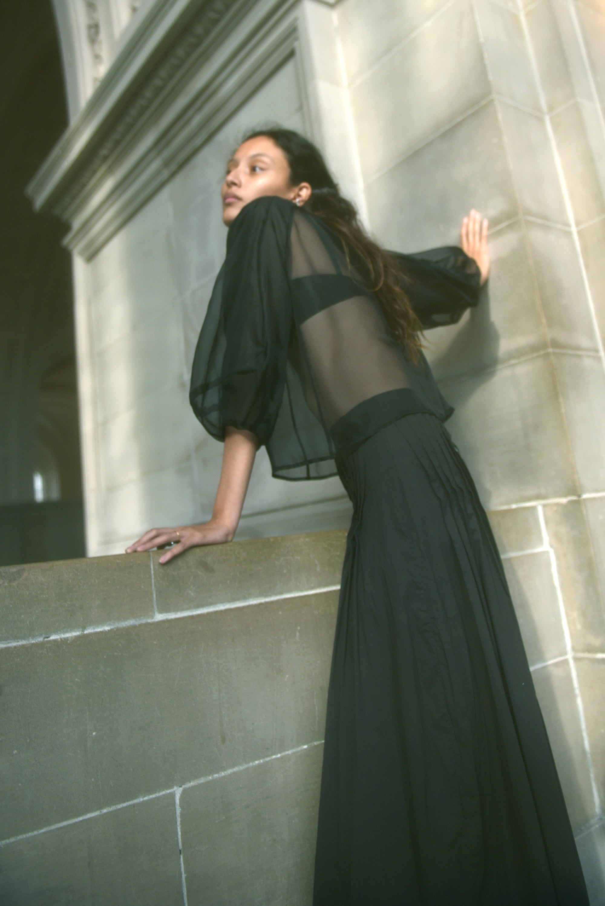 Alternate editorial image of the black silk organza Kamperett Meiere Blouse.