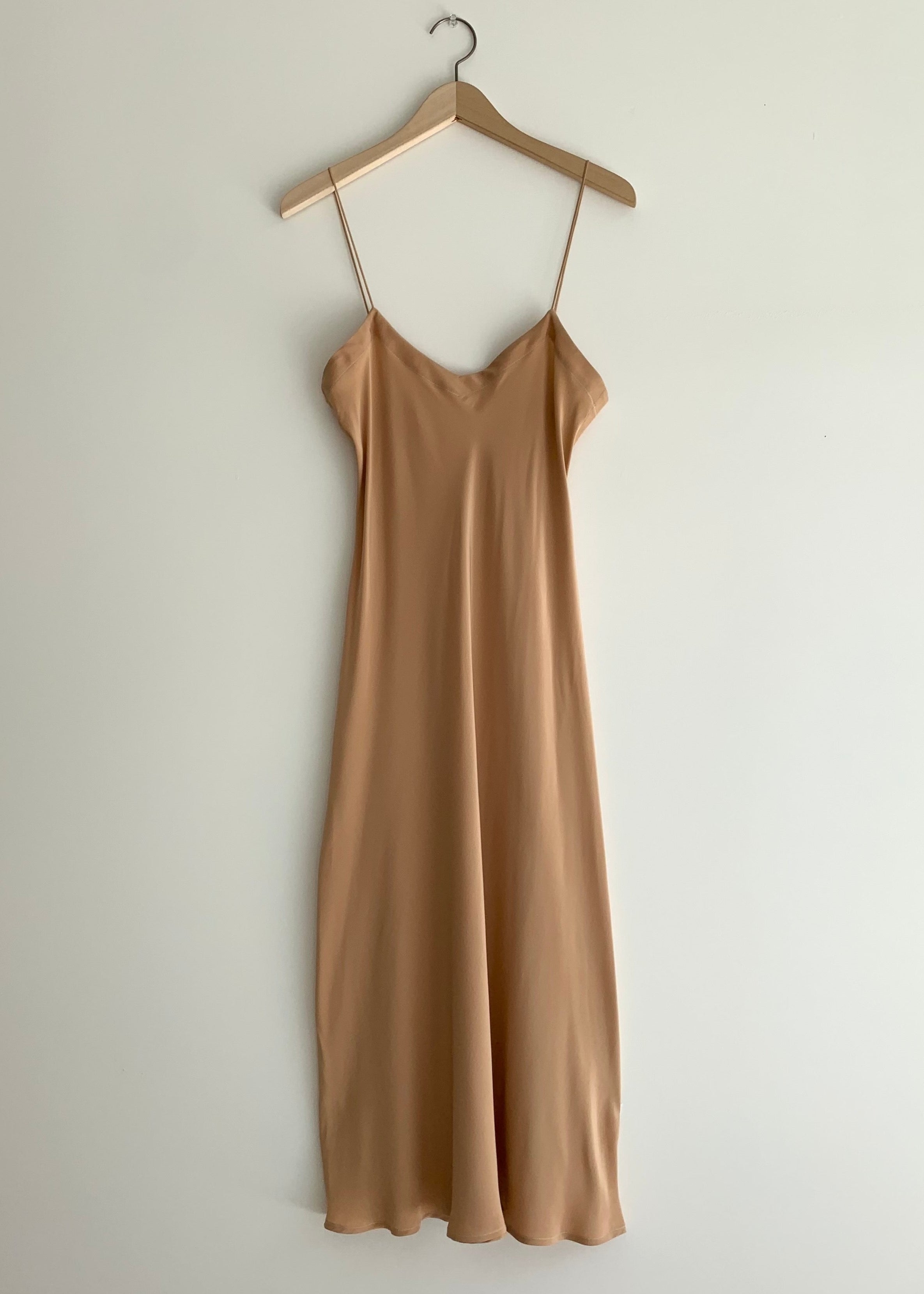 Flat front view of the buff silk Kamperett V-Neck Midi Slip with V-neckline.